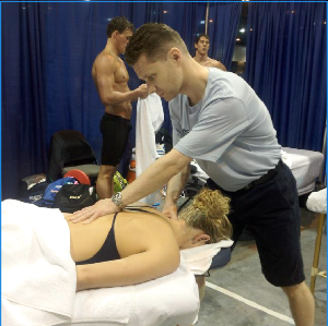 Brian working on the back of a swimmer